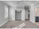 Bedroom featuring grey walls, carpet, a ceiling fan, and a closet with open doors at 3699 Goodwater St, Mount Pleasant, SC 29466