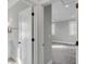 View from the bathroom of a bedroom with grey walls, carpet, and shuttered windows at 3699 Goodwater St, Mount Pleasant, SC 29466