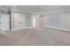 Carpeted bedroom with ceiling fan, closet, and an ensuite bathroom featuring modern neutral paint colors at 3699 Goodwater St, Mount Pleasant, SC 29466