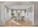 Elegant dining room with stylish chandelier and hardwood floors, perfect for entertaining guests at 3699 Goodwater St, Mount Pleasant, SC 29466