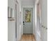 Clean entryway with a view through a windowed door to the outdoors, enhanced with neutral colors at 3699 Goodwater St, Mount Pleasant, SC 29466