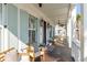 Inviting front porch with comfortable seating and stylish decor, perfect for relaxing outdoors at 3699 Goodwater St, Mount Pleasant, SC 29466