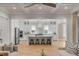 Bright, open kitchen featuring a large island with seating and modern stainless steel appliances at 3699 Goodwater St, Mount Pleasant, SC 29466
