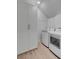 Convenient laundry room area with sleek washer and dryer units and storage cabinets at 3699 Goodwater St, Mount Pleasant, SC 29466