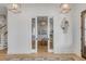 Stylish office space with glass sliding doors, decorative lighting, and neutral decor at 3699 Goodwater St, Mount Pleasant, SC 29466