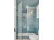 Walk-in shower with blue subway tiles and a built-in niche at 3699 Goodwater St, Mount Pleasant, SC 29466