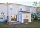 The back of the home with a patio, sliding glass door and some greenery at 4722 Whitwil Blvd, North Charleston, SC 29418