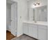 Bathroom with a large white vanity and a combined shower and bath with a clear glass shower door at 4722 Whitwil Blvd, North Charleston, SC 29418