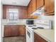 Functional kitchen featuring wooden cabinets, modern appliances, and linoleum flooring at 4722 Whitwil Blvd, North Charleston, SC 29418