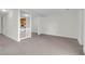 Bright living room featuring neutral carpet and an opening to the kitchen at 4722 Whitwil Blvd, North Charleston, SC 29418
