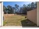 Large backyard with a privacy fence and ample green space at 5146 Park Creek Ave, North Charleston, SC 29418