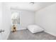 Bedroom with a large window for natural light, carpet flooring, and minimalist decor at 5146 Park Creek Ave, North Charleston, SC 29418