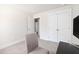 Bedroom with a desk, chair, closet, and carpet flooring; natural light from windows at 5146 Park Creek Ave, North Charleston, SC 29418