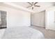 Bedroom featuring carpet flooring, a ceiling fan, and an ensuite bathroom with glass shower at 5146 Park Creek Ave, North Charleston, SC 29418