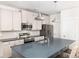 Bright kitchen with stainless steel appliances, custom cabinets, and a large island at 5146 Park Creek Ave, North Charleston, SC 29418