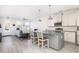 Open-concept living room featuring an island with bar stool seating at 5146 Park Creek Ave, North Charleston, SC 29418