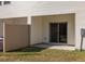 An inviting outdoor patio features a ceiling fan and glass door access to a well-maintained backyard at 5146 Park Creek Ave, North Charleston, SC 29418