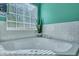 Modern tub with jets and subway tile at 5420 Percival Ln, North Charleston, SC 29420