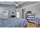 Open bedroom layout with ensuite bath and walk-in closet offers natural light at 5420 Percival Ln, North Charleston, SC 29420