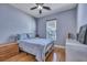 Cozy bedroom features natural light, and a ceiling fan at 5420 Percival Ln, North Charleston, SC 29420