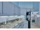 Kitchen showcasing granite countertops and stainless steel refrigerator with decor at 5420 Percival Ln, North Charleston, SC 29420