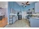 Bright kitchen with gray cabinets, granite countertops, and stainless steel appliances at 5420 Percival Ln, North Charleston, SC 29420