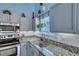 Stylish kitchen featuring stainless steel appliances and granite countertops with decor at 5420 Percival Ln, North Charleston, SC 29420