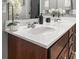 Double vanity bathroom with granite countertops and cherry wood cabinets at 615 Ravens Wood Rd, Summerville, SC 29486