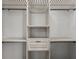 White closet with shelves and a drawer, and gray carpet at 615 Ravens Wood Rd, Summerville, SC 29486