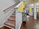 Foyer features stairs and hardwood floors leading to the living and dining spaces at 615 Ravens Wood Rd, Summerville, SC 29486