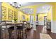 Open concept living area with dark floors, stylish decor, and access to dining area at 615 Ravens Wood Rd, Summerville, SC 29486