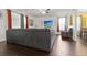 Open concept living space with dark floors, modern furniture, and ample natural light at 615 Ravens Wood Rd, Summerville, SC 29486