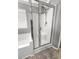 Bathroom featuring a shower and a separate tub with glass doors at 615 Ravens Wood Rd, Summerville, SC 29486