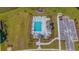 Aerial view of the community pool, playground, and parking area with landscaping at 625 Sienna Way, Summerville, SC 29486