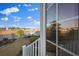 Backyard view from the window showing a view of the pond and other houses at 625 Sienna Way, Summerville, SC 29486