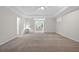 Large bedroom with neutral carpet, ceiling fan, and view to another room at 625 Sienna Way, Summerville, SC 29486