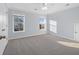 Light and bright bedroom features neutral carpet, crown molding, and two bright, sunny windows at 625 Sienna Way, Summerville, SC 29486