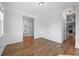 Spacious living room with hardwood floors, white wainscoting and lots of natural light at 625 Sienna Way, Summerville, SC 29486