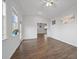 Bright room showcasing hardwood floors, a large window, and white walls at 625 Sienna Way, Summerville, SC 29486