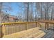 Spacious wooden deck overlooking fenced backyard and neighboring houses at 659 Hamlet Cir, Goose Creek, SC 29445