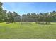Community baseball field with wooden dugouts and bleachers on a bright sunny day at 659 Hamlet Cir, Goose Creek, SC 29445