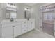 Main bathroom featuring double sink vanity, modern lighting, and updated fixtures at 659 Hamlet Cir, Goose Creek, SC 29445
