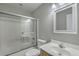 Well-lit bathroom features a shower-tub combo and vanity with a framed mirror at 659 Hamlet Cir, Goose Creek, SC 29445