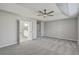 Large bedroom with tray ceiling, ceiling fan, and ensuite bathroom at 659 Hamlet Cir, Goose Creek, SC 29445