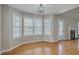 Sun-drenched breakfast nook featuring large windows and views to the backyard and fireplace at 659 Hamlet Cir, Goose Creek, SC 29445