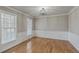 Elegant dining room featuring hardwood floors, decorative molding, and ample natural light at 659 Hamlet Cir, Goose Creek, SC 29445