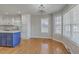 Bright kitchen featuring stainless appliances and view to sun-drenched breakfast nook and large windows at 659 Hamlet Cir, Goose Creek, SC 29445