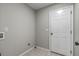 Mud room featuring neutral paint and tile, and a white door at 659 Hamlet Cir, Goose Creek, SC 29445