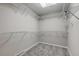 Spacious walk-in closet with ample shelving for organized storage and clothing at 659 Hamlet Cir, Goose Creek, SC 29445