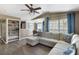 Comfortable living room features a ceiling fan, a view of the dining room and a sectional sofa at 700 Daniel Ellis Dr # 5302, Charleston, SC 29412